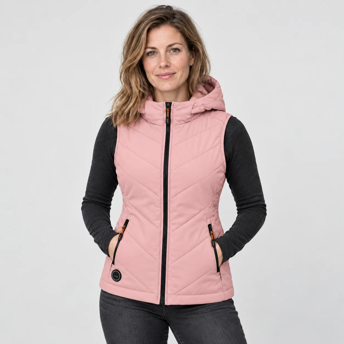 Varmevest dame med hette PyreFit Transitor i rosa, forfra